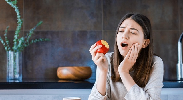 Răng lung lay: Nguyên nhân, dấu hiệu và cách điều trị hiệu quả 2 Dấu hiệu nhận biết răng lung lay